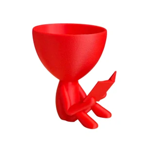 Květináč- postava s knihou