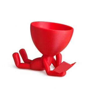 Květináč-ležící postava s knihou